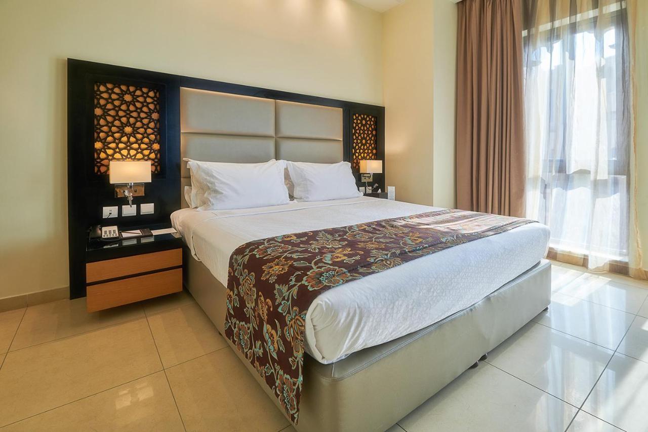 Bahi Ajman Palace Hotel Zewnętrze zdjęcie A bedroom at the hotel